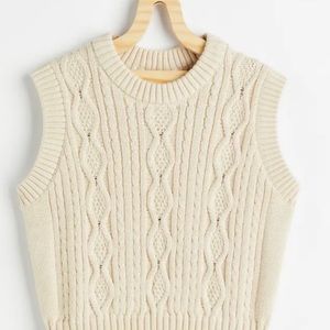 Knitted off white sweater vest